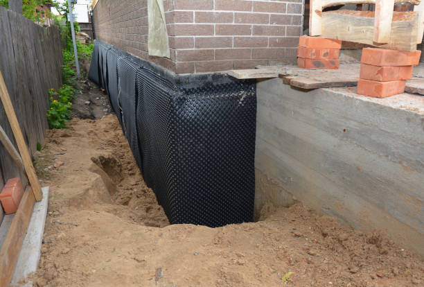 SJ Waterproofing Pros technician performing targeted Emergency Waterproofing assessment in La Grange Park, IL